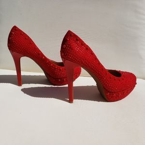 Red studded heel